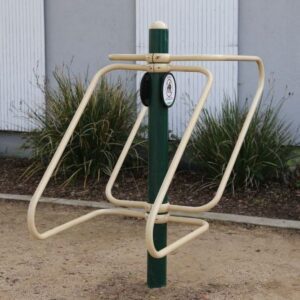 A 2-Person Push-Ups & Dips Station with a green handle on it.
