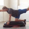 A Man Exercising on a Smart Tera Core Balance Step